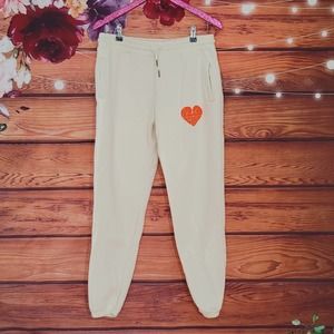 Beige Sweatpants with Orange Heart Design